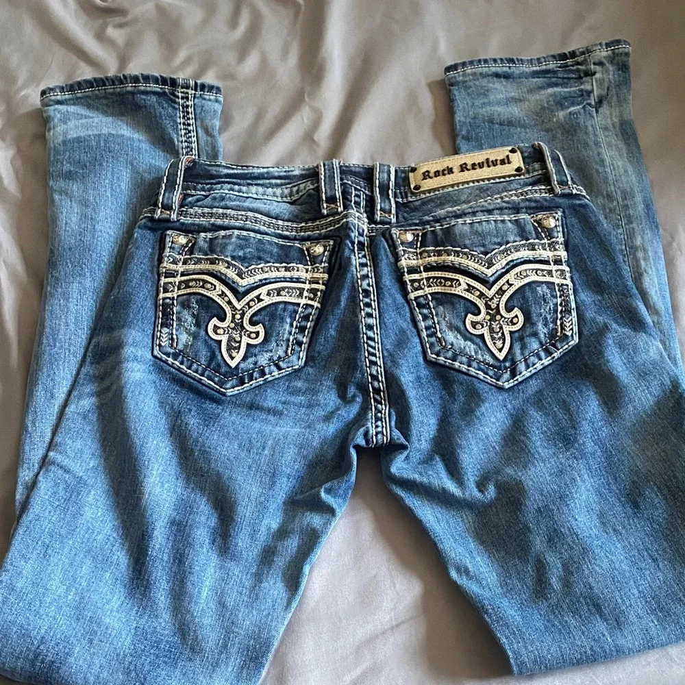 Rock Revival Women's Distressed Blue straight Cut Jeans - Picture 3 of 5